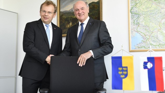 Botschafter Andrej Rahten und Erwin Pröll (Bild: APA/NLK FILZWIESER)