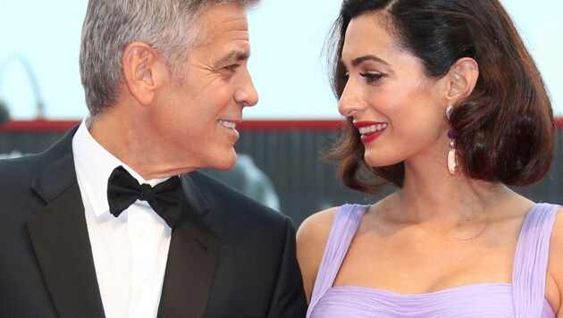 George Clooney und seine Amal (Bild: Invision)
