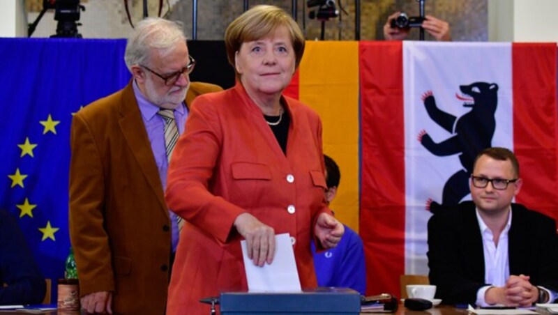 Angela Merkel bei der Stimmabgabe in Berlin (Bild: AFP)