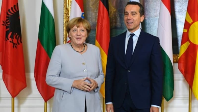 Kern mit Merkel im Bundeskanzleramt (Bild: APA/AFP/JOE KLAMAR)