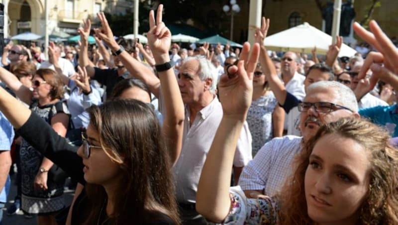 Am Dienstag forderten Demonstranten in Valletta Gerechtigkeit für den Mord an der Journalistin. (Bild: AFP)