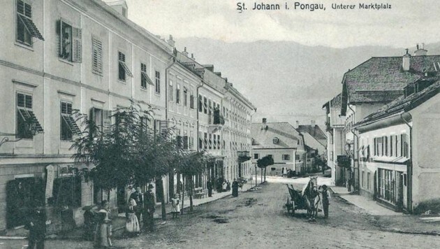 Vergangene Zeit: Dort, wo heute die Autos stauen, war damals noch ein Fuhrwerk unterwegs (Bild: Gemeinde St. Johann)