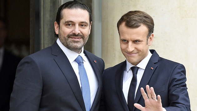 Macron will im Konflikt vermitteln und lud Hariri zu sich ein. (Bild: APA/AFP/BERTRAND GUAY)