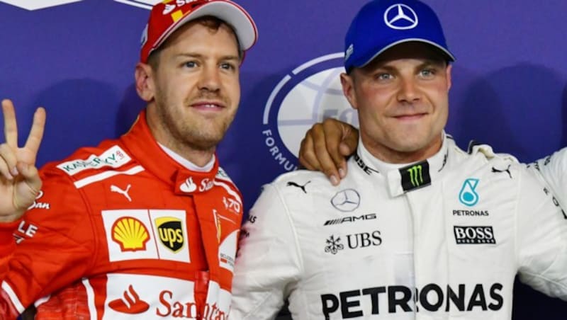Sebastian Vettel und Valtteri Bottas (Bild: AFP)
