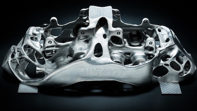 Dieser Titan-Bremssattel stammt aus dem 3D-Drucker. (Bild: Bugatti)
