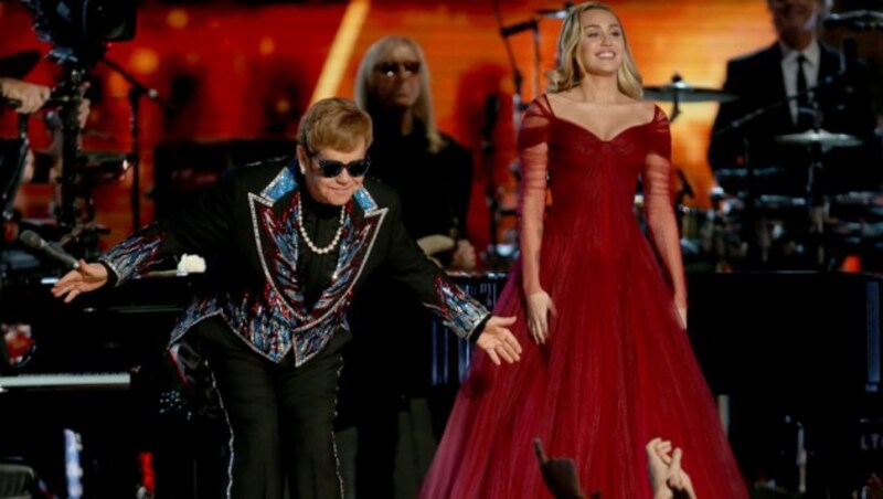 Elton John und Miley Cyrus (Bild: AP)