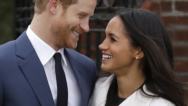 Prinz Harry und Meghan Markle (Bild: AP)