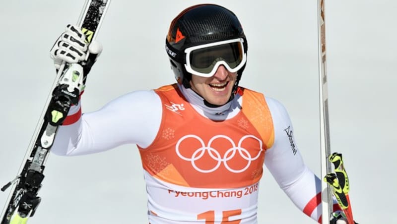 Matthias Mayer jubelt im Ziel nach seiner Goldmedaille (Bild: APA/HANS KLAUS TECHT)