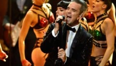 Robbie Williams begeistert im kommenden Jahr gleich dreimal seine Fans in Österreich (Bild: AFP)