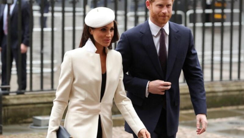 Meghan Markle mit Prinz Harry (Bild: AFP or licensors)