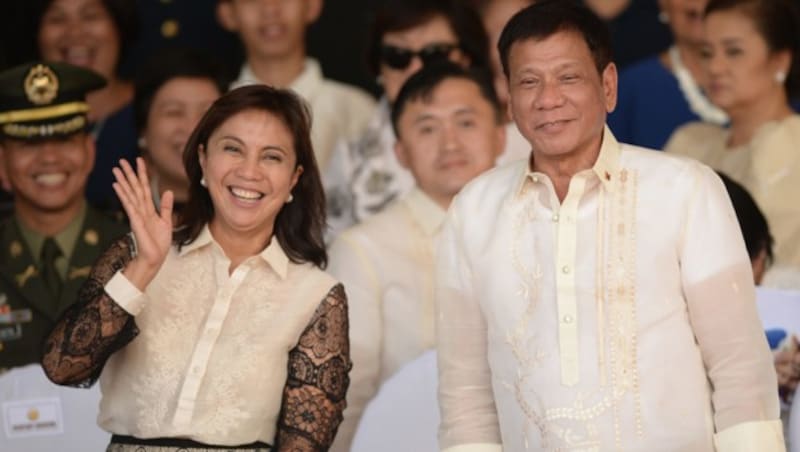 Leni Robredo und der philippinische Präsident Rodrigo Duterte (Bild: AFP)