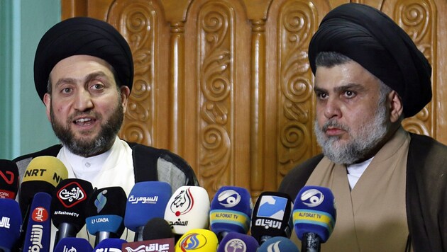 Ammar al-Hakim (links) und Muktada al-Sadr (rechts) sind die Wahlsieger im Irak und werden den USA wohl Kopfzerbrechen bereiten. (Bild: APA/AFP/Haidar HAMDANI)