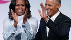 Barack Obama mit seiner Frau Michelle (Bild: AFP)