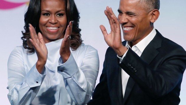 Barack Obama mit seiner Frau Michelle (Bild: AFP)