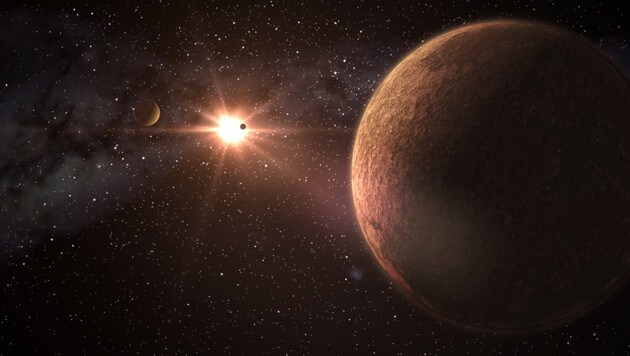 Künstlerische Darstellung von K2-239 mit den drei erdgroßen Planeten (Bild: Gabriel Perez Diaz, SMM (IAC))