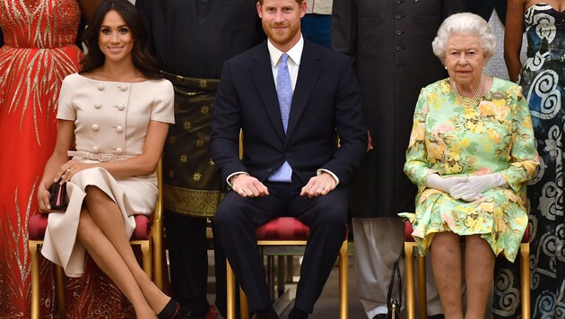 Meghan mit Prinz Harry und Queen Elizabeth (Bild: AFP)