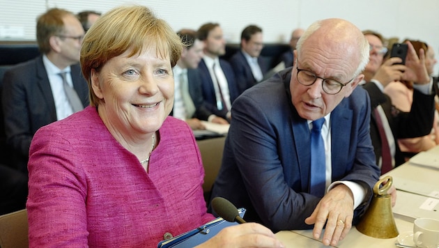 Die deutsche Kanzlerin Angela Merkel, Unionsfraktionschef Volker Kauder (Bild: AFP)