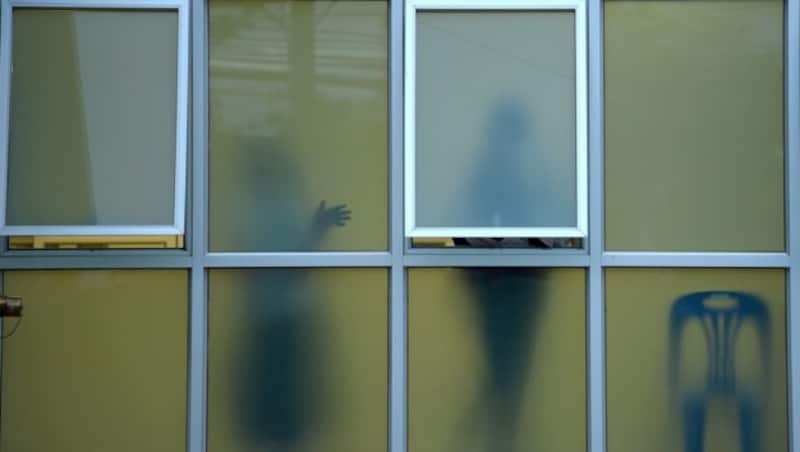 Im Krankenhaus machen sich die Familien der Buben auf ein erstes Wiedersehen bereit. (Bild: AFP )