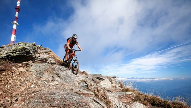 Den Mountainbikern gefällt’s am Goldeck, wo man bis hinauf zum Gipfelkreuz radeln kann (Bild: Sam Strauss)