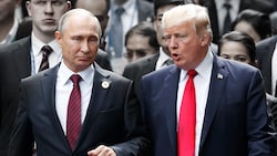 Kremlchef Wladimir Putin wünscht sich offenbar Donald Trump zurück ins Weiße Haus. (Bild: AP/Jorge Silva/Pool, krone.at-Grafik)