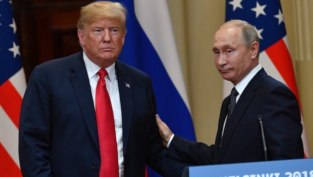 Donald Trump and Vladimir Putin at their meeting in Helsinki in 2018 (Bild: AFP)