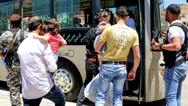 Migranten an der syrisch-libanesischen Grenze (Bild: AFP)