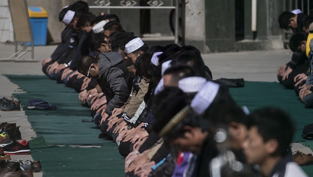 Chinesische Muslime beim Gebet (Bild: AFP)