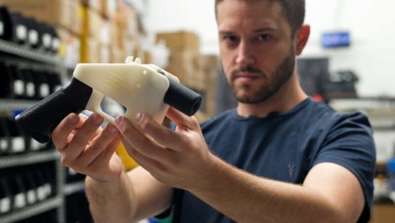 Cody Wilson mit dem 3D-gedruckten „Liberator“ (Bild: AFP)