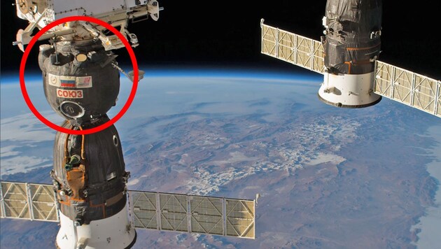 Im rot markierten Teil der „Sojus MS-09“ wurde das Loch entdeckt. Rechts im Bild die „Sojus MS-08“. (Bild: NASA, krone.at-Grafik)