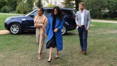 Herzogin Meghan mit ihrer Mutter Doria Ragland und Prinz Harry (Bild: AFP or licensors)