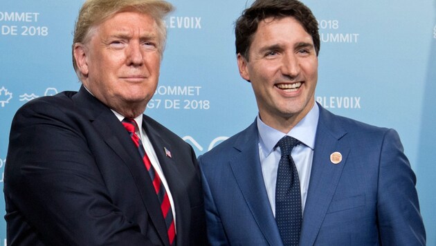US-Präsident Trump (li.) und Kanadas Premier Trudeau (Bild: APA/AFP/SAUL LOEB)