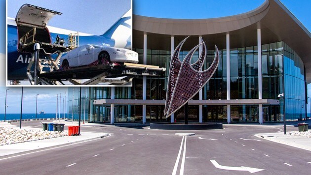 Für das Gipfeltreffen wurden Luxus-Autos eingeflogen und ein neues Kongresszentrum gebaut. (Bild: AFP, AirBridgeCargo Airlines, krone.at-Grafik)