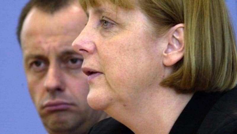 Friedrich Merz und Angela Merkel auf einem Bild aus dem Jahr 2001 (Bild: APA/dpa/dpaweb)