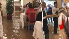 Das Video aus einem überfluteten Ristorante im Zentrum von Venedig ist auf Facebook millionenfach abgerufen worden. (Bild: facebook.com, krone.at-Grafik)