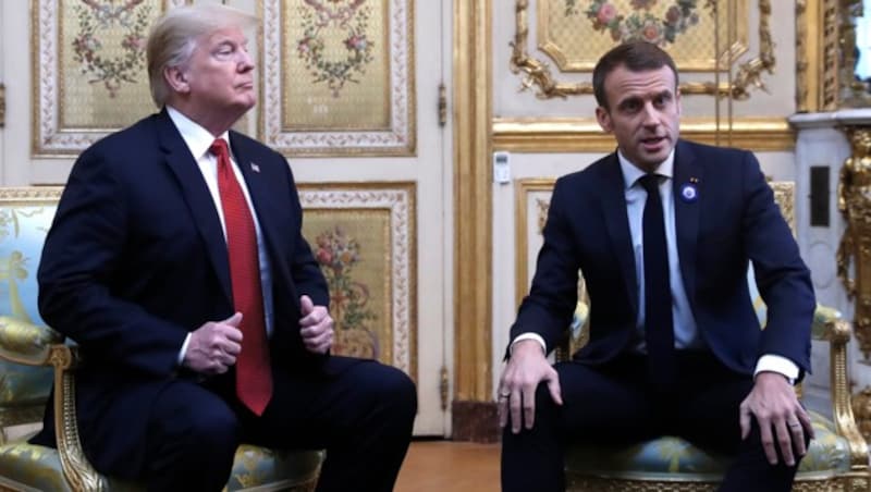 Donald Trump mit Emmanuel Macron (Bild: AP)