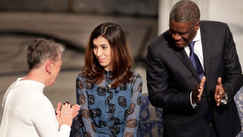 Die yezidische Aktivistin Nadia Murad aus dem Irak und der kongolesische Gynäkologe Denis Mukwege haben in Oslo den Friedensnobelpreis entgegen genommen. Sie wurden für ihren Einsatz gegen sexuelle Gewalt in Konfliktregionen ausgezeichnet.
 (Bild: AFP)