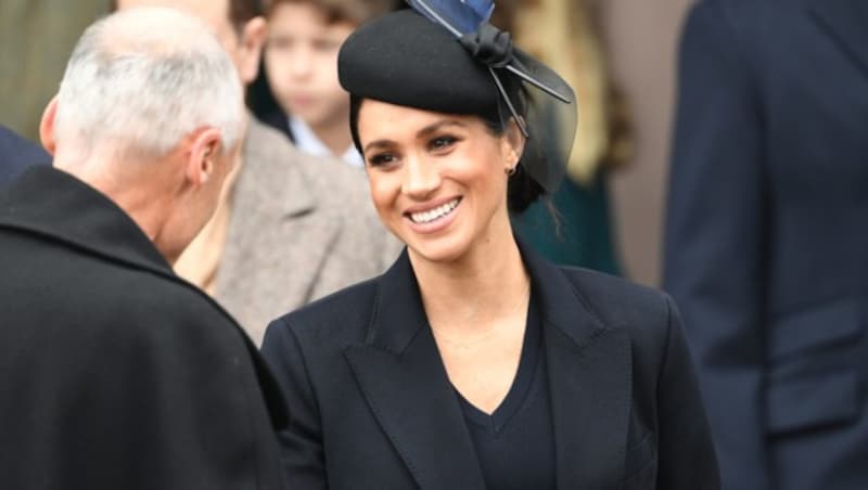 Herzogin Meghan vor der St. Mary Magdalene Church in Sandringham in Norfolk (Bild: AFP)