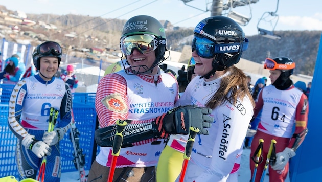 Richi Leitgeb und Jessica Gfrerer jubeln nach dem Sieg im Teambewerb. (Bild: Unisport Austria)