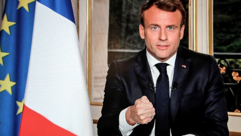 Präsident Macron bei seiner TV-Ansprache (Bild: APA/AFP/LUDOVIC MARIN)