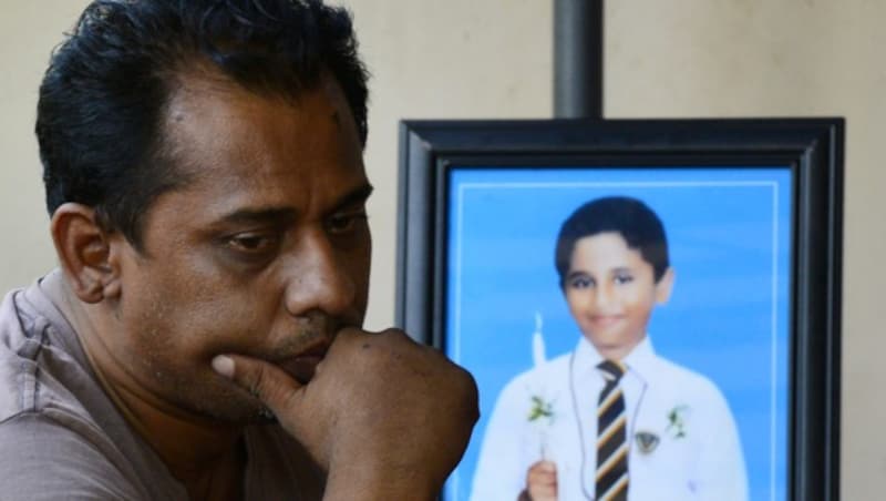 Ranjeewa Silva verlor seinen zwölfjährigen Sohn Enosh bei den Anschlägen. (Bild: AFP)