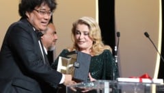 Goldene Palme in Cannes an Bong Joon Ho für den Film „Parasite“ (Bild: AFP)