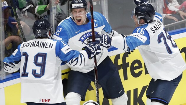 Die Spieler von Weltmeister Finnland freuen sich über eine kurze Anreise zur WM 2021 ... (Bild: The Associated Press)