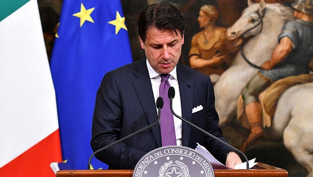 Schwere Zeiten für Italiens Premier Giuseppe Conte (Bild: AFP)