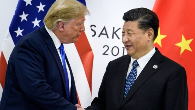US-Präsident Donald Trump mit Chinas Präsident Xi Jinping (Bild: AFP)