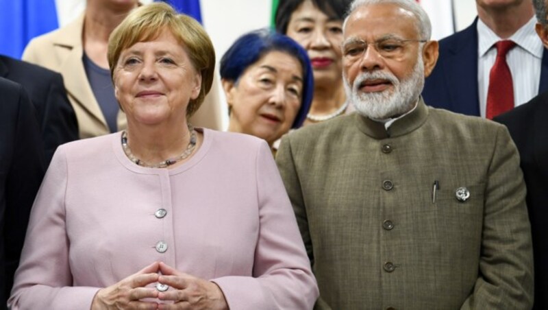 Angela Merkel mit Indiens Premier Narendra Modi (Bild: AFP)