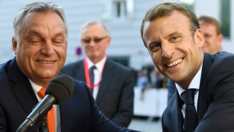 Ungarns Premier Viktor Orban und Frankreichs Präsident Emmanuel Macron (Bild: AFP)