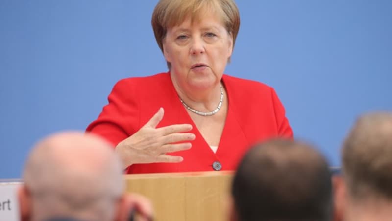 Merkel im Kreuzverhör (Bild: APA/dpa/Wolfgang Kumm)