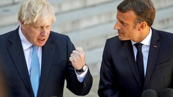 Der britische Ex-Premier Boris Johnson (li.) soll Emmanuel Macron derb beleidigt haben (Bild: APA/AFP/GEOFFROY VAN DER HASSELT)