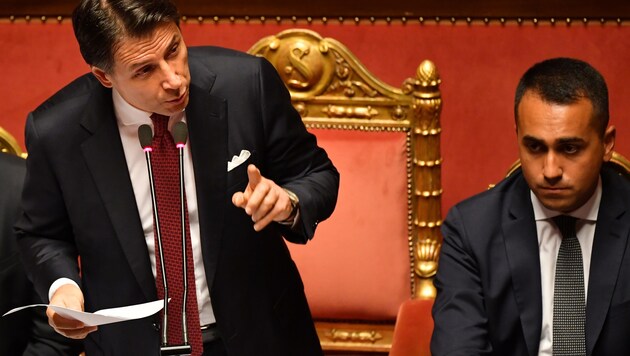 Italiens Premier Giuseppe Conte (li.) und Außenminister Luigi Di Maio (Fünf-Sterne-Bewegung) (Bild: AFP)