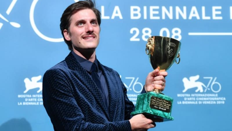 Luca Marinelli wurde mit dem Preis für den besten Schauspieler ausgezeichnet. (Bild: AFP)